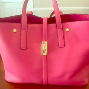 Bright pink tote with handbag inside.